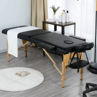 Masa de masaj pliabila, 2 zone, cadru lemn, spuma 5cm, inaltime 55-76cm, piele ecologica, dimensiuni 60x213cm, culoare Neagra Masa de masaj pliabila, 2 zone, cadru lemn, spuma 5cm, inaltime 55-76cm, piele ecologica, dimensiuni 60x213cm, culoare Neagra